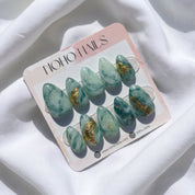 Jade press-on nails on Noho Nails card